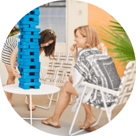 2 people playing jenga