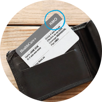 A fake insurance card in a leather wallet with HMO circled