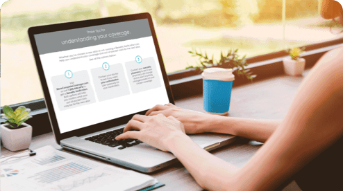 Person on computer learning about insurance coverage