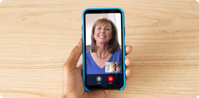 Hand Holding Phone and Video Chatting with a SKYRIZI Nurse Ambassador